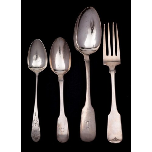 An Irish silver Fiddle pattern tablespoon, a fork and two de...
