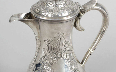 An early George III silver hot water pot.