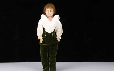 An unusual mid 19th century English poured wax boy doll