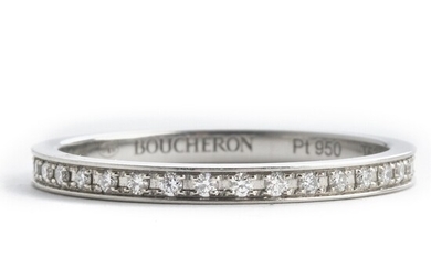 Boucheron: A diamond eternity ring set with numerous brilliant-cut diamonds, mounted in platinum. D-G/IF-VS. Size 53. Ref. no. JAL00230–53. Serial no. N94909.