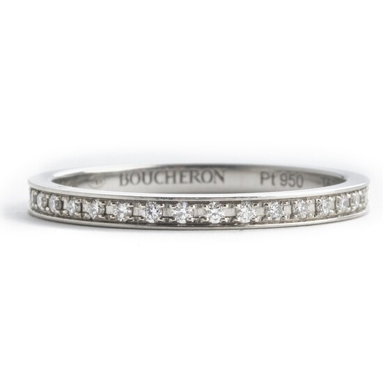 Boucheron: A diamond eternity ring set with numerous brilliant-cut diamonds, mounted in platinum. D-G/IF-VS. Size 53. Ref. no. JAL00230–53. Serial no. N94909.