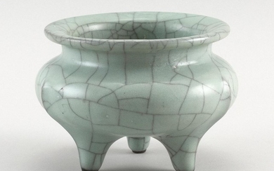 CHINESE GUAN WARE PORCELAIN TRIFOOT CENSER In squat ovoid form. Height 4.5". Diameter 5.5".