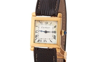Cartier France. Charming and Refined Tank Obus Wristwatch in Yellow Gold, With Black Roman Numerals Dial