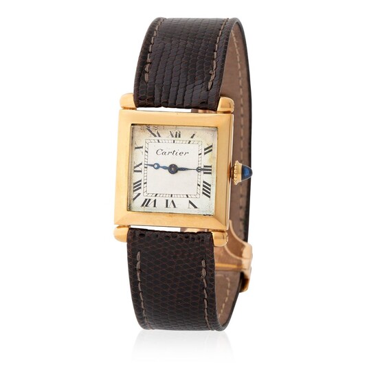 Cartier France. Charming and Refined Tank Obus Wristwatch in Yellow Gold, With Black Roman Numerals Dial