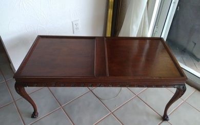 Carved mahogany coffee table with gallery