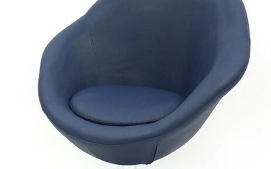 Contemporary swivel lounge chair with blue faux leather