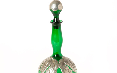 DECANTER. A green glass and tin, Art Nouveau, early 20th century.