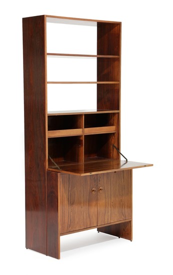 Danish furniture design: A Brazilian rosewood shelving unit, front with two doors, shelves and writing leaf. 1960s. H. 194. W. 86. D. 45 cm.