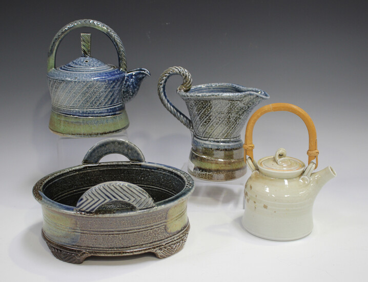 Four pieces of Jane Hamlyn studio pottery, including a salt glazed teapot, height 16cm, and a simila