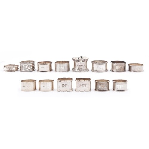 Fourteen silver napkin rings, Victorian-Elizabeth II, 9ozs...