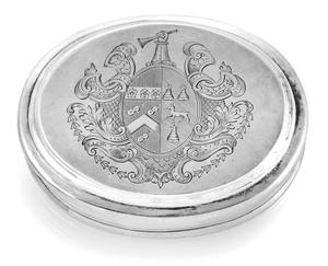 GEORGE I SILVER TOBACCO BOX, William Paradise, London, 1720. Oval, the pull off cover with engraved coat-of-arms, fully hallmarked on rim, marked inside cover. C. 131g. Min. dents.