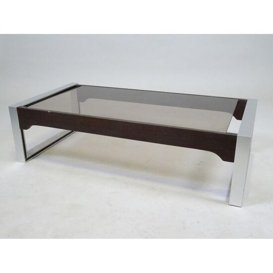 GUILLARD Claude. Coffee table in rosewood and chromed metal. Glass...