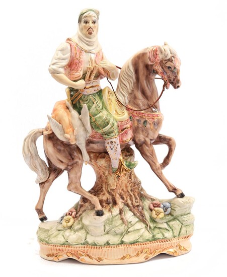 (-), Glazed earthenware statue of an Arab on...