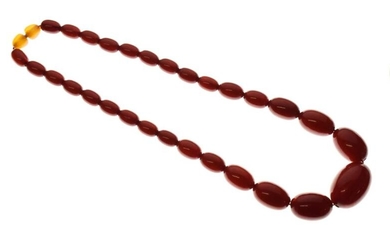 Graduated row of amber beads, 53g gross Condition: Thirty-one...