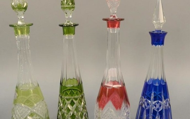 Group of four cut to clear glass decanters, two green