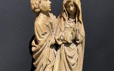 Groupe religieux finement sculpté représentant un saint et une sainte en bois.