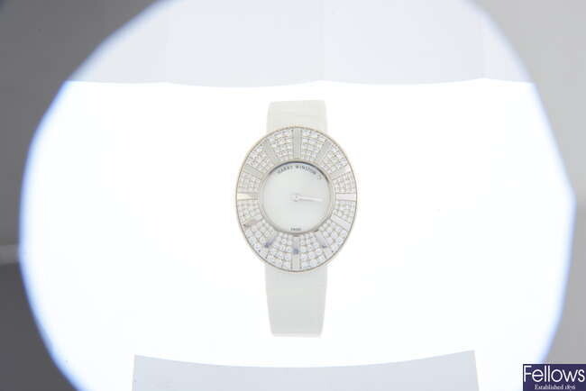 HARRY WINSTON - a factory diamond set 18ct white gold Talk To Me wrist watch, 32x39mm.