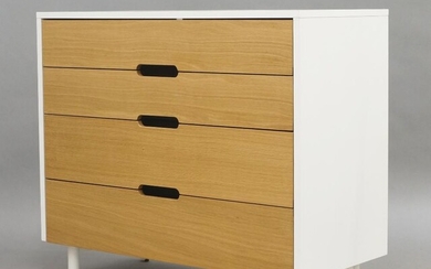 Habitat, a pair of 'Bumble' chests, of recent manufacture, in white lacquered finish with four oak drawers, on cylindrical supports, each 82cm high, 95.5cm wide, 45cm deep (2)