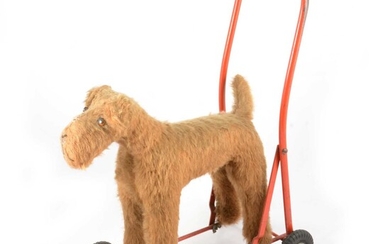 International Model Aircraft ltd, Tri-ang push-a-long dog toy on wheels and steel stand.