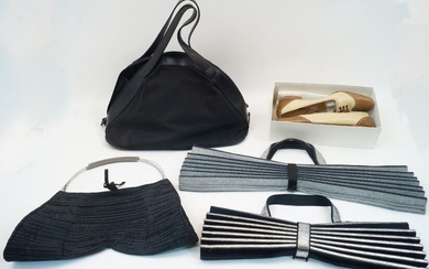 Issey Miyake: two 'Accordion' pleated bags, one in grey felt and one in black and silver felt, each with fabric and metal clasp, approximately 47cm x 54.5cm and 37cm x 40cm at full extension, together with a black canvas and leather trim holdall...