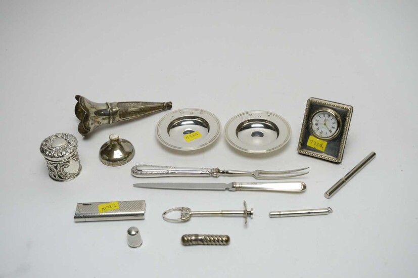 Items of small silver including a Victorian balm pot, a bedside clock and a letter opener.