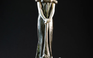 JULIEN CAUSSE (FRENCH 1869-1914): AN ART NOUVEAU SILVERED AND PATINATED BRONZED SPELTER FIGURE ‘FEE DES GLACES’ OR 'THE ICE MAIDEN'