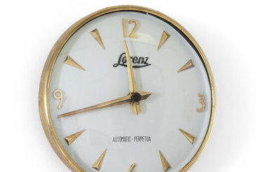 LORENZ (Editore) Un orologio da parete, anni '60. Funzionante. Diametro cm 20....
