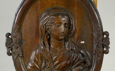 Large oak "Medallion" carved in high relief representing...