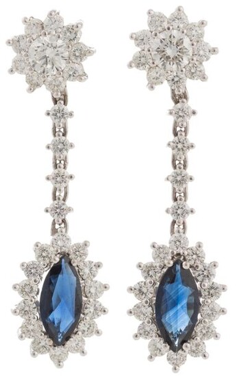 Long earrings white gold 18kts First body brilliant rosette, center brilliant cut diamonds and lower body marquise cut central sapphire with diamonds Estimated weight sapphire 1.80 cts, estimated weight brilliant 4.1 cts Total weight 11.5 g