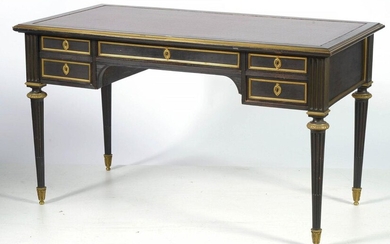 Louis XVI style double-sided flat desk with mahogany core covered with blackened pearwood veneer opening by five drawers and a shelf trimmed with burgundy leather. Gilt bronze ornamentation. Parisian work. Period: 19th century. Size : +/-130x74,5x70,5cm.