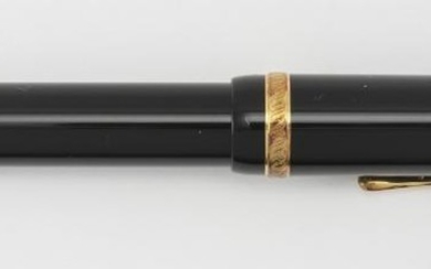 MONTBLANC VOLTAIRE FOUNTAIN PEN Sterling silver vermeil mounts with foliate design. 18kt gold nib dated 1995. Length 6".