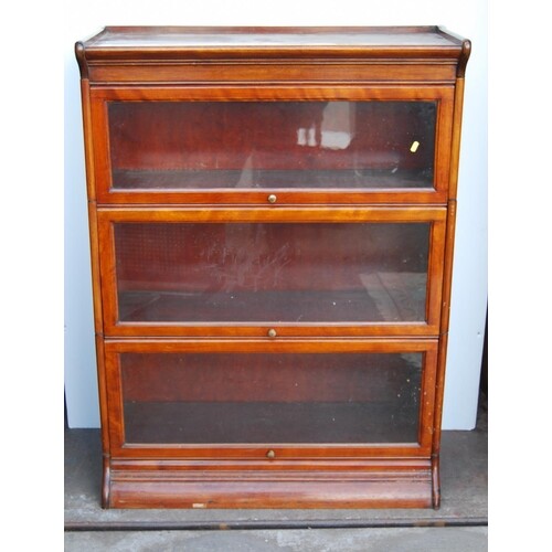 Mahogany stacking bookcase, the three sections each with gla...