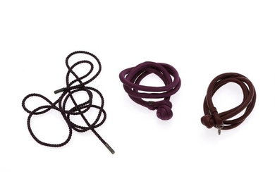 Ole Lynggaard: A collection comprising of two Sweet Drop bracelets and a braided string of silk. (3)