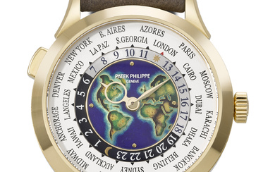 PATEK PHILIPPE. A RARE AND ATTRACTIVE 18K GOLD AUTOMATIC WORLD...