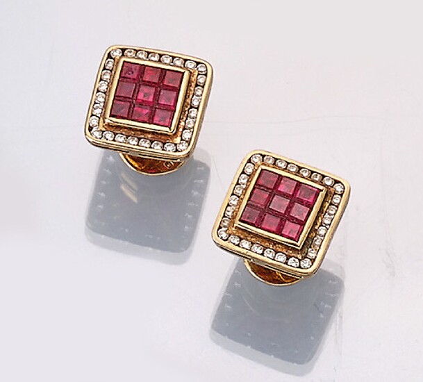 Pair of 18 kt gold earrings with ruby...