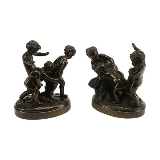 Pair of Patinated Bronze Figural Groups.