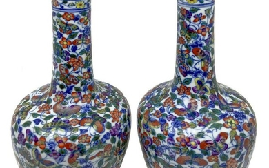 Pair of vases decorated with flowers over the entire