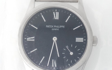 Patek Philippe. Limited Edition and Sophisticated Calatrava Wristwatch in Platinum, Reference 5026, With Black Dial Made for the New Millennium and Extract from Archives