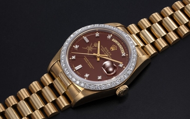 ROLEX, A GOLD AND DIAMOND-SET OYSTER PERPETUAL DAY-DATE WITH “KHANJAR” INSIGNIA ON THE "OXBLOOD" DIAL, REF. 18048