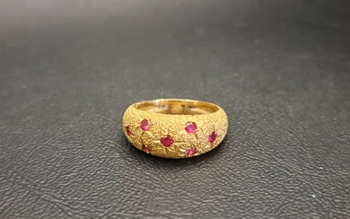 RUBY SET BOMBE STYLE GYPSY RING with seven flush set rubies ...