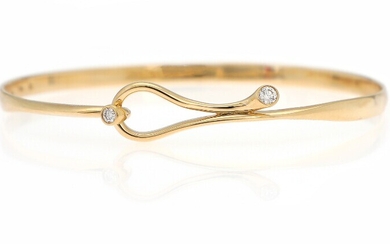 SOLD. Regitze Overgaard: "Magic" diamond bracelet set with two brilliant-cut diamonds, mounted in 18k gold....