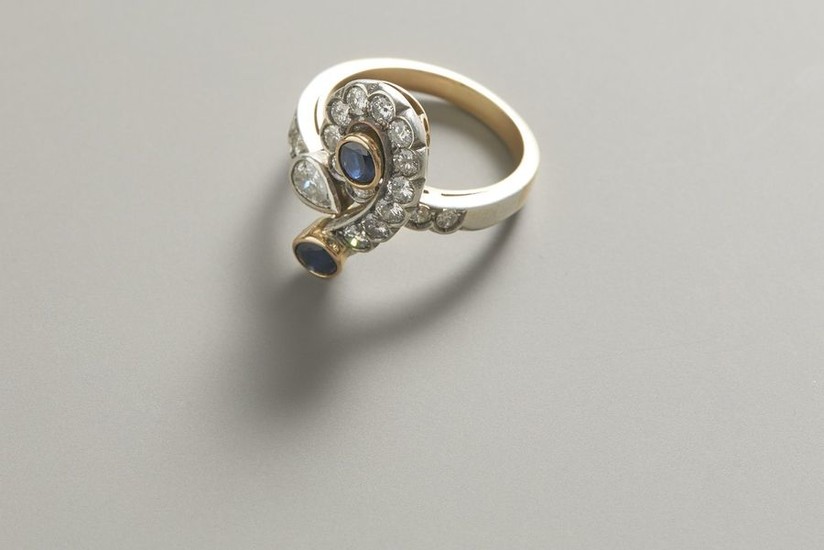 Ring in yellow and white gold with diamonds...
