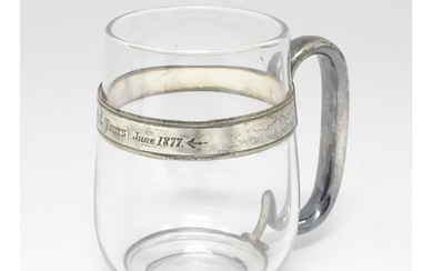 Rowing Interest: A 19thC glass tankard with silver plate han...