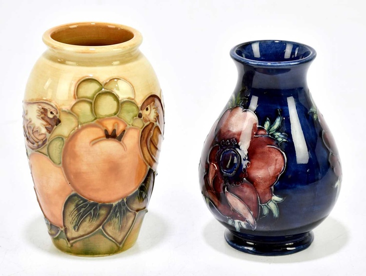 SALLY TUFFIN FOR MOORCROFT; a cylindrical vase decorated in the...