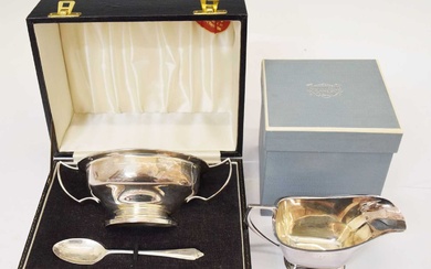 Silver twin handled bowl and spoon, boxed and a silver sauce boat