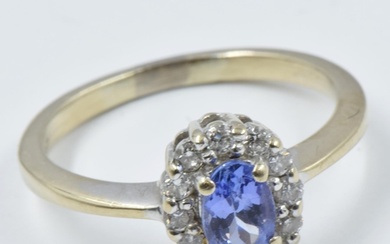 Small 18ct gold tanzanite and diamond oval cluster ring