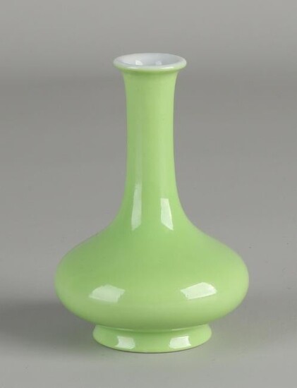 Small Chinese miniature vase with green glaze.