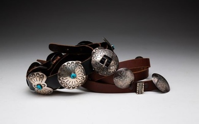 TWO SILVER CONCHO BELTS.