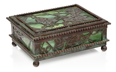 Tiffany Studios (American 1902-1938), a patinated bronze and green marbled glass 'Grapevine' box and cover, c.1910, stamped Tiffany Studios, New York, Rectangular form, with openwork vine, leaves and grapes, with marbled glass top, sides and...
