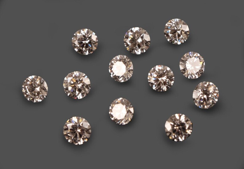 Twelve Loose Round Brilliant Cut Diamonds, weighing 0.30, 0.30, 0.31, 0.31, 0.31, 0.31, 0.32, 0.33